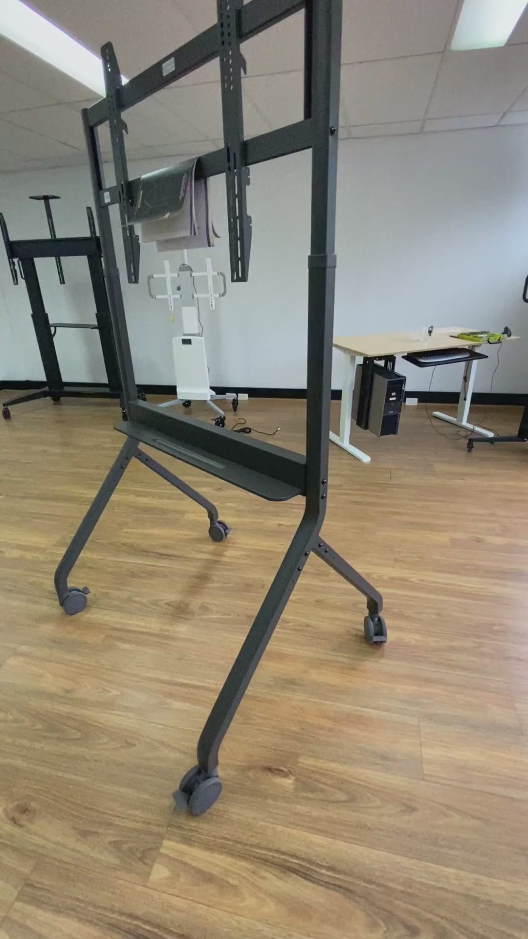 Load video: Heavy Duty Electric Height Adjustable TV Trolley Mount for 80-110 Inch Screens P320