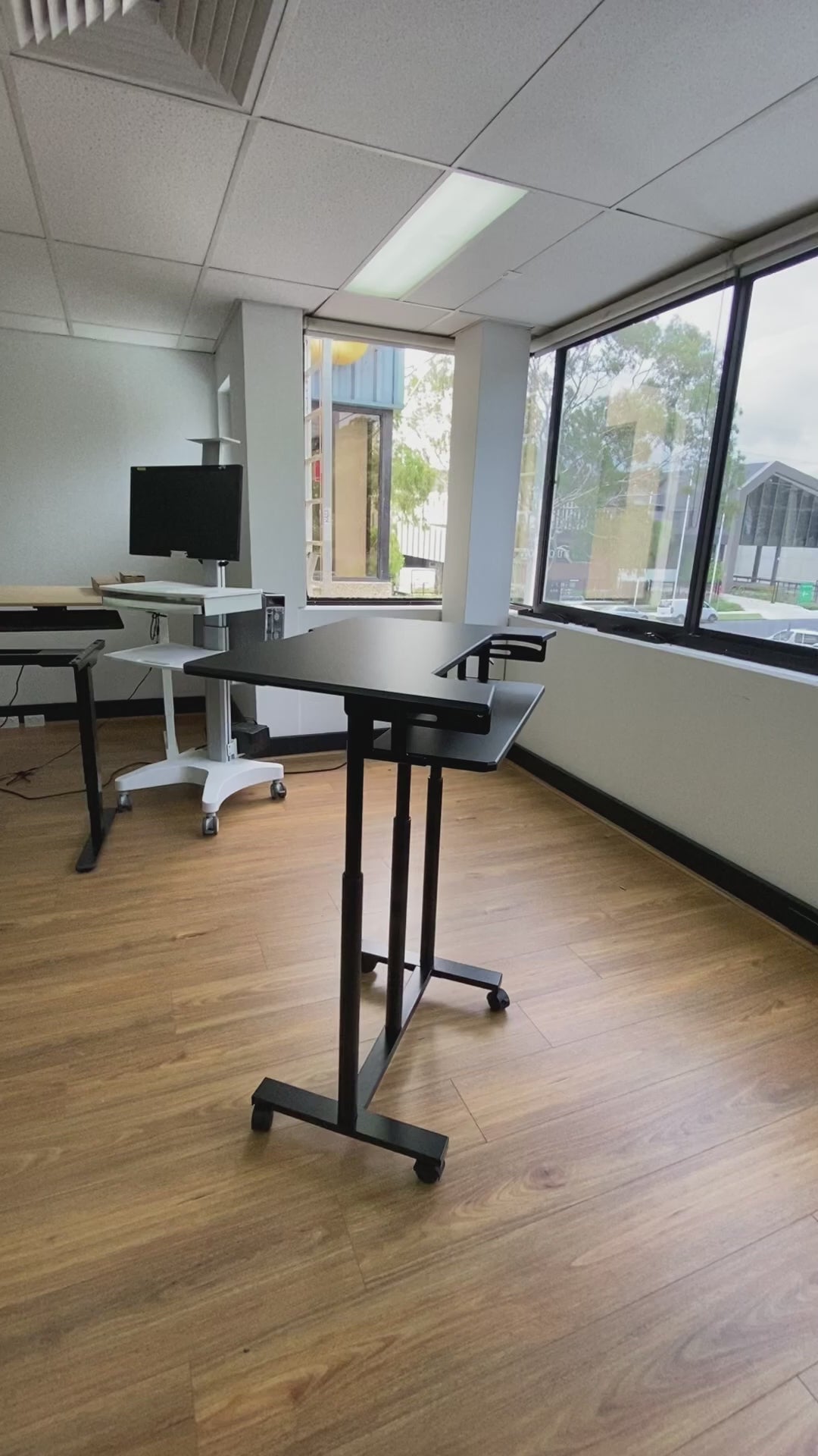 Load video: Mobile WHEELY Sit Stand Desk Work Station 899X564MM FDS301