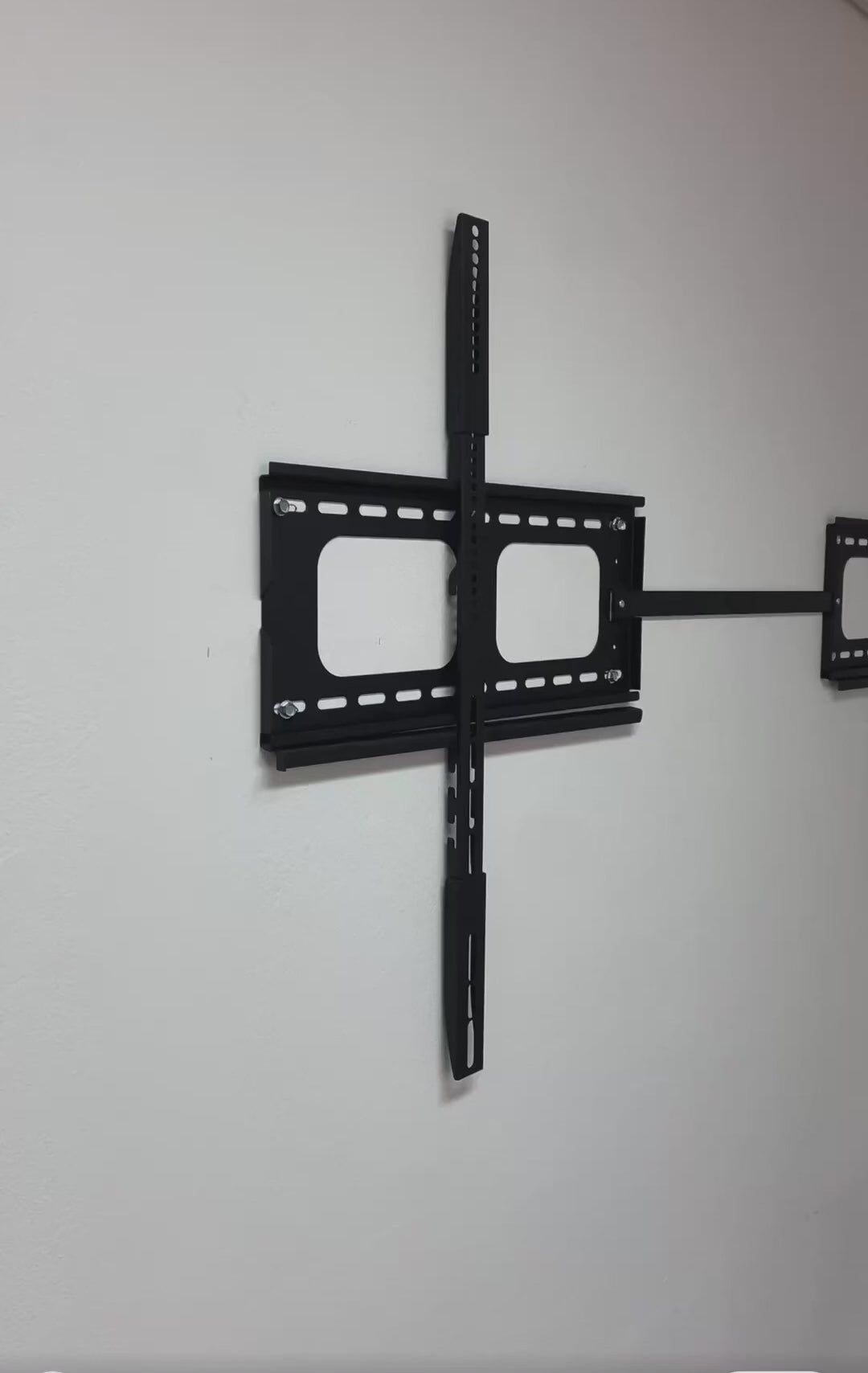 Load video: Dual Panel Split TV Wall Mount for Flexible Screen Placement SPLIT Model